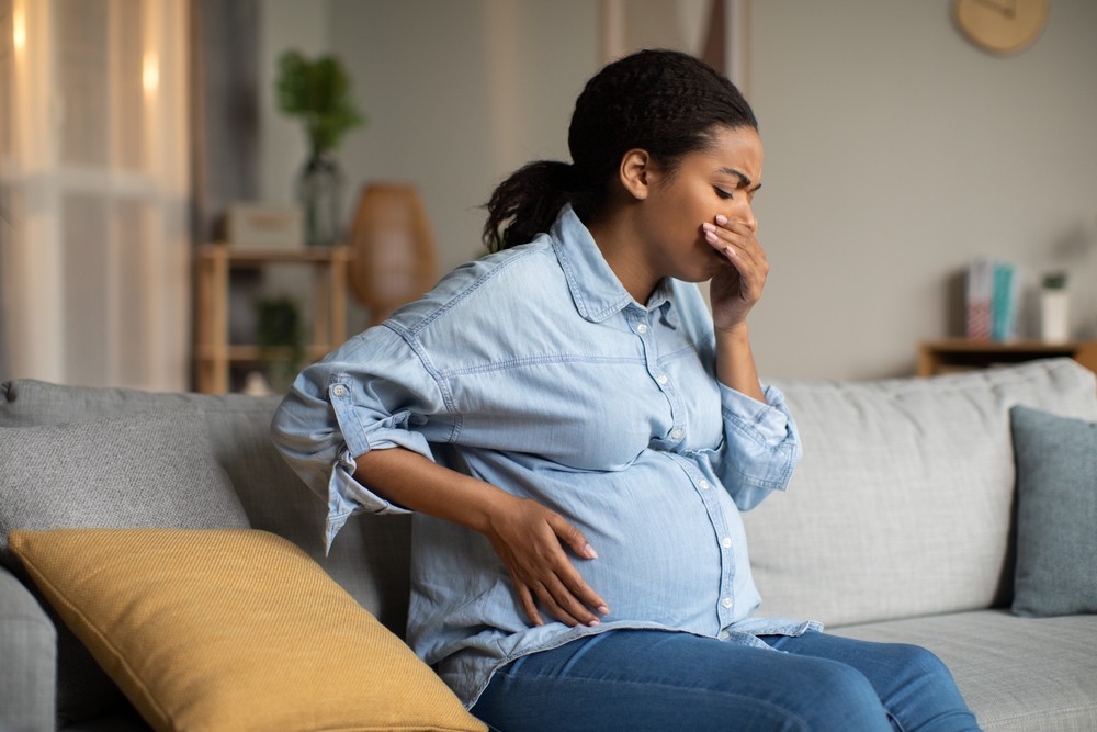 woman suffering from morning sickness in Howard County