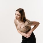 woman with menstrual cramping and period pain in Howard County