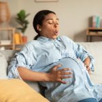 woman experiencing Braxton Hicks contractions during pregnancy