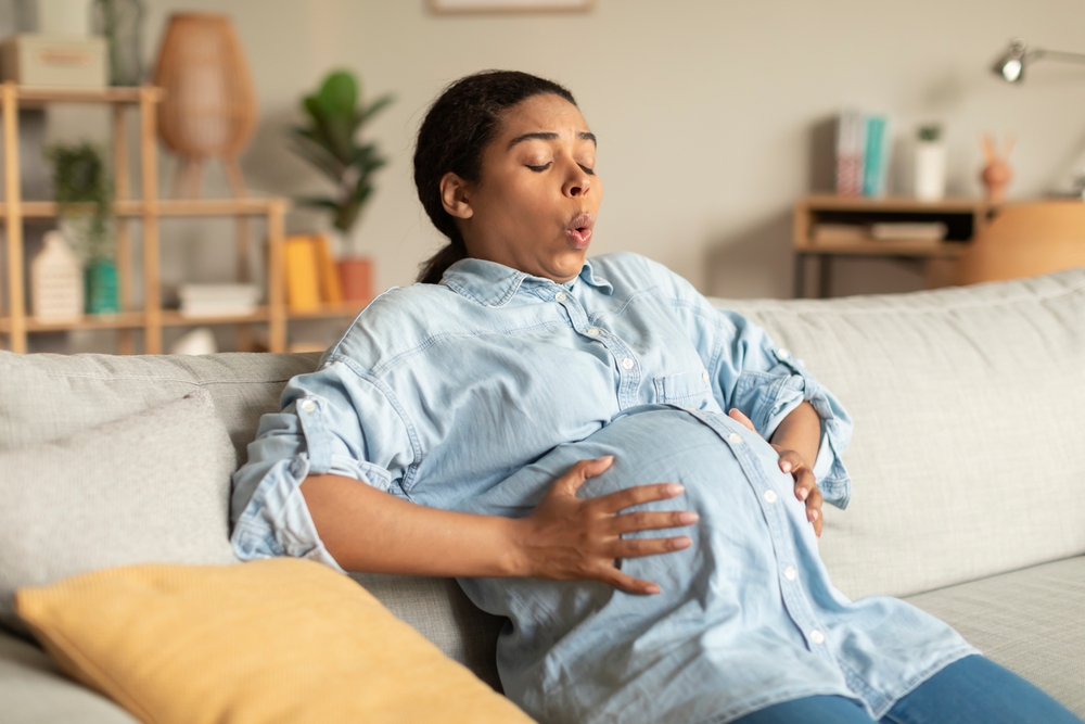 woman experiencing Braxton Hicks contractions during pregnancy